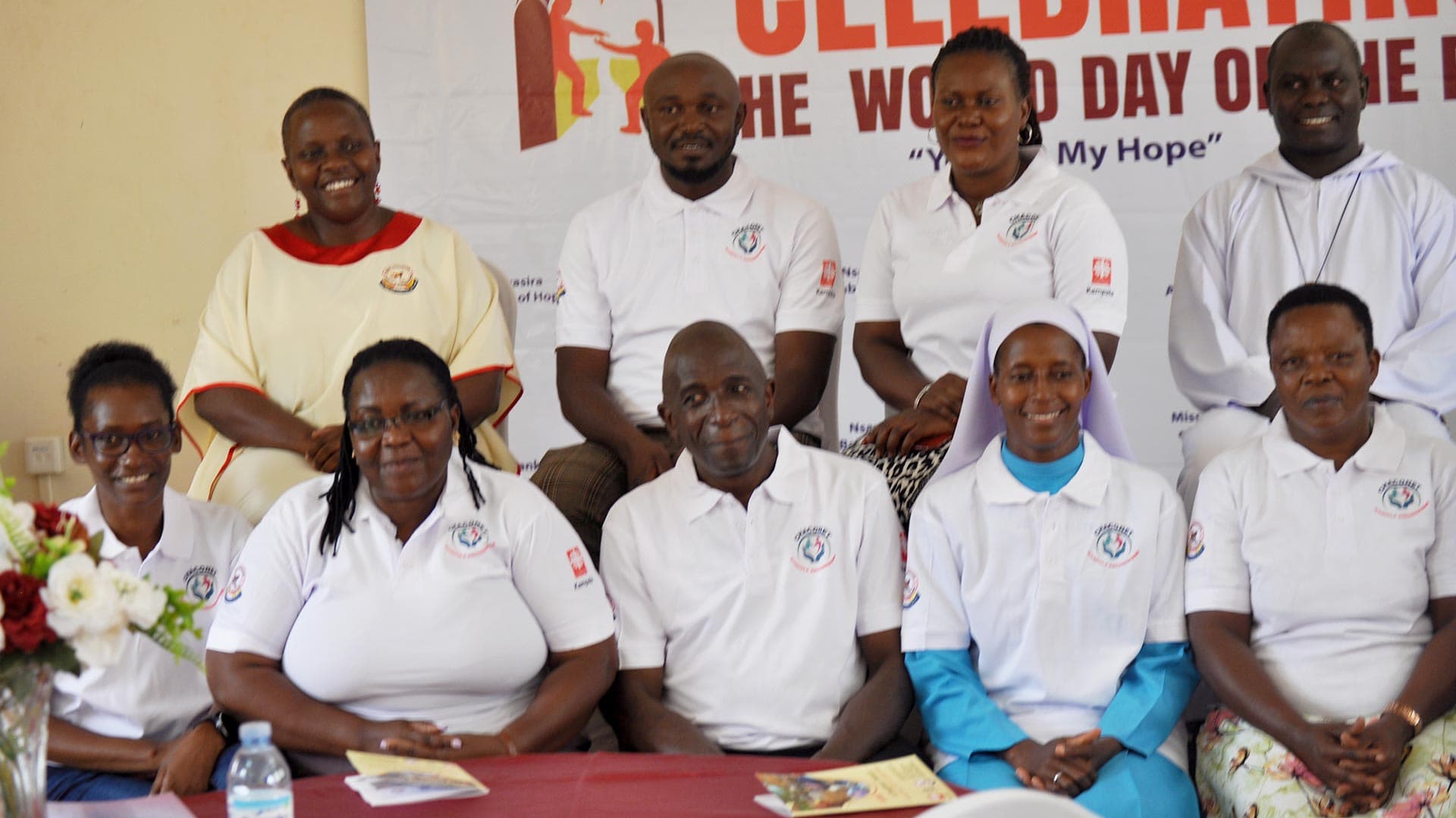 Caritas Kampala staff and partners gathered at a formal Chaconet network event